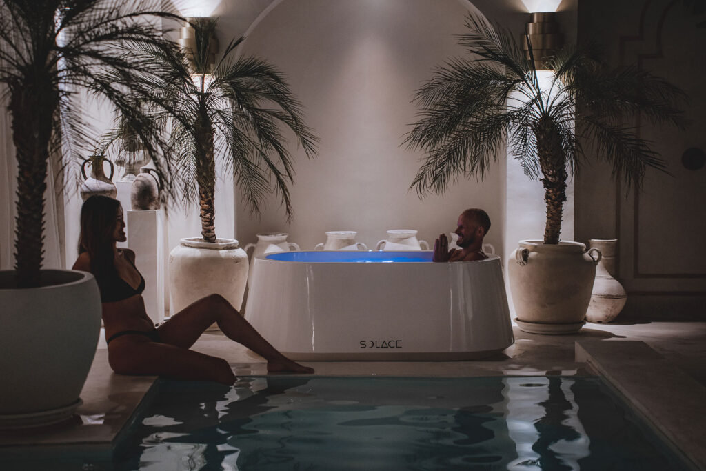 Man and woman use Solace Ice Bath for cold plunge routine