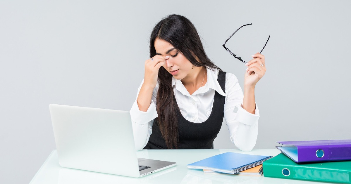 Woman suffering from occupational strain, in need of home infrared sauna