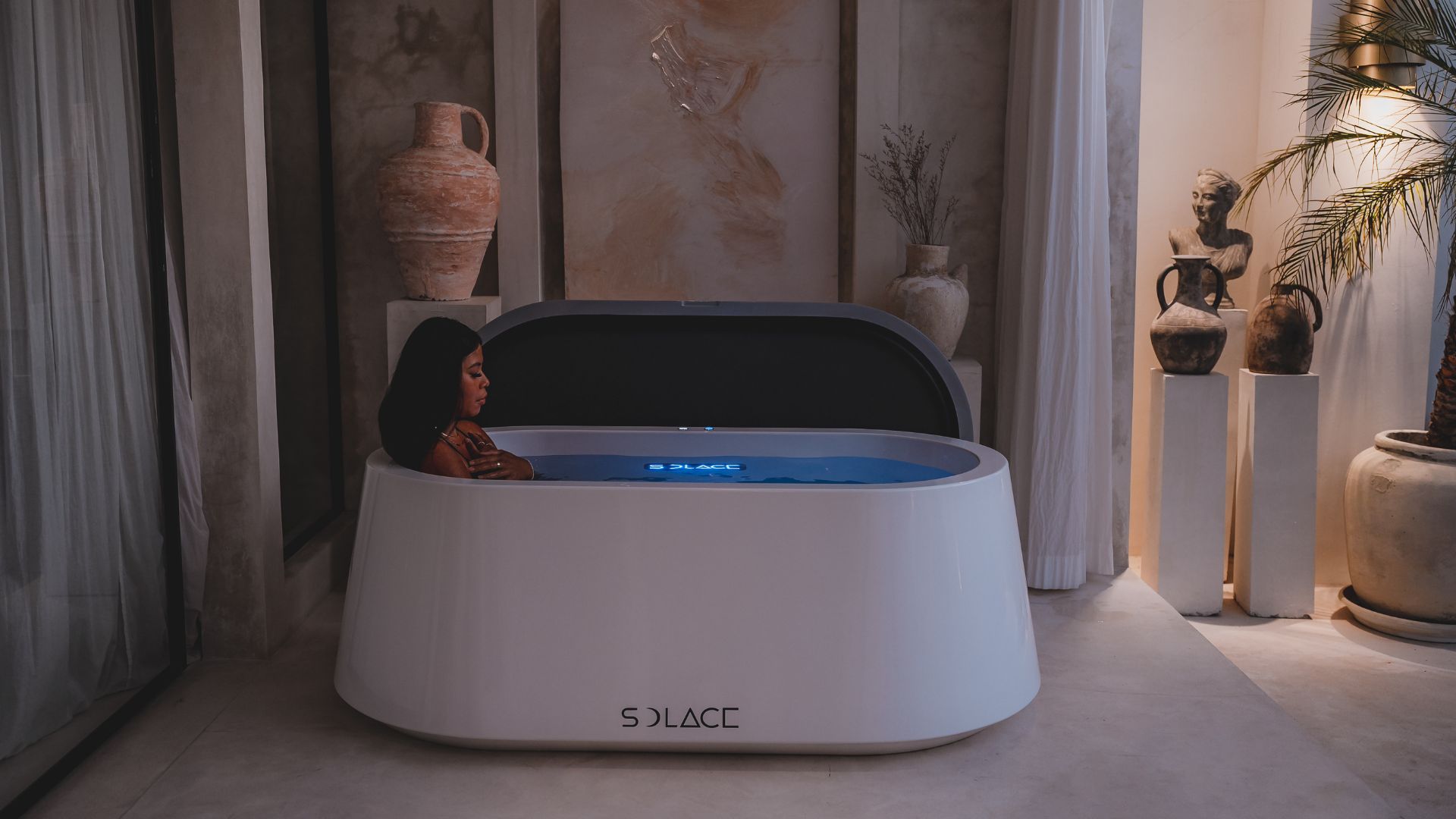 Woman using ice bath to boost mental clarity and mood