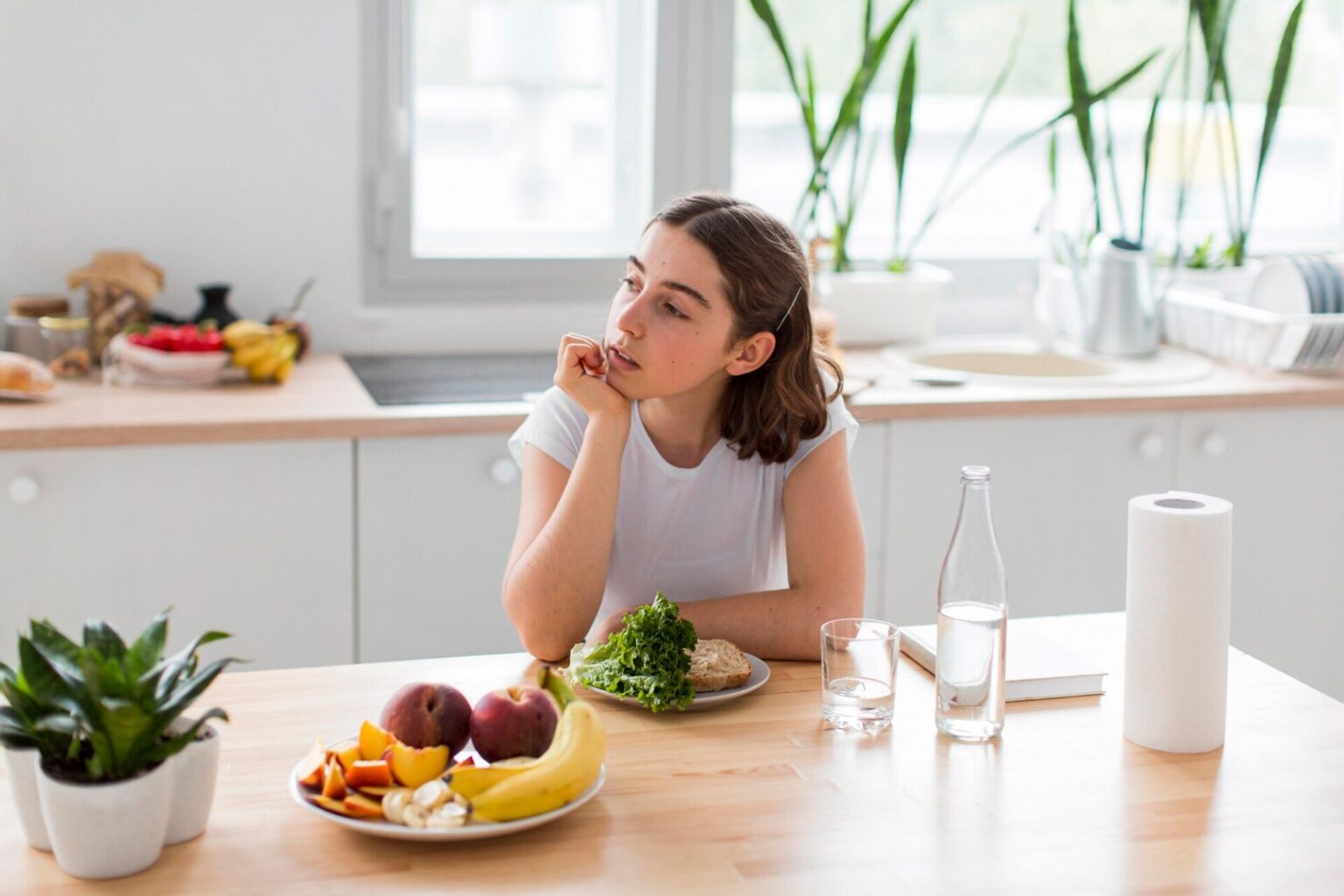 Woman with timed meal for her infrared sauna session