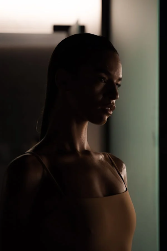 Woman wearing swimsuit for infrared sauna session