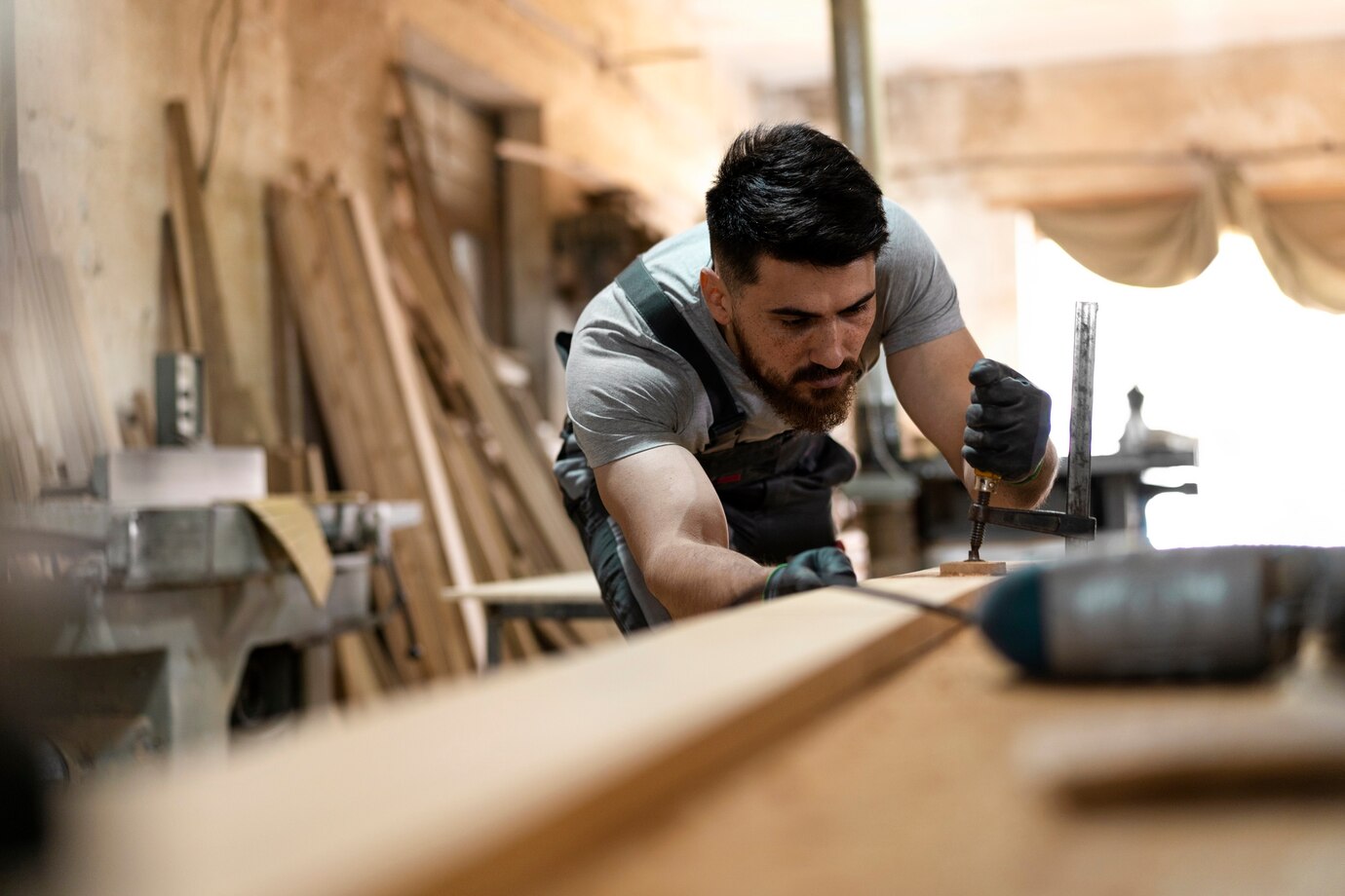 Woodworker building panelling for an infrared sauna